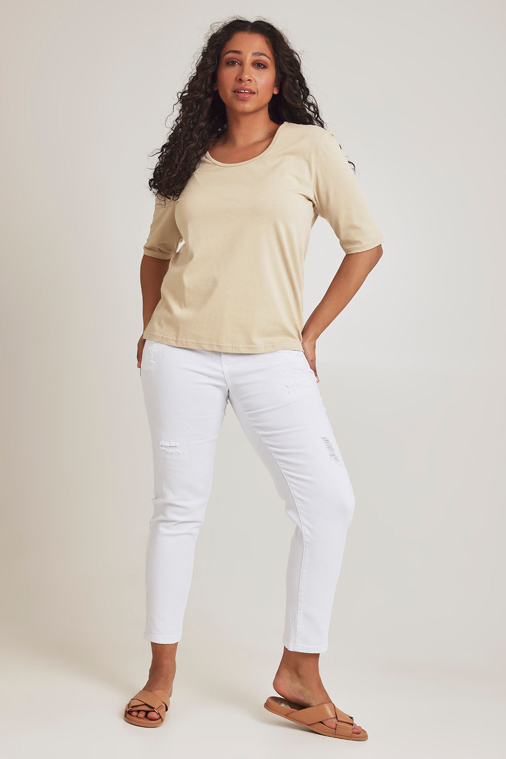 Model Terri-Leigh wearing size 14 of The Luxe Pima Cotton Tee in colour Nougat, from the front, showing the whole outfit