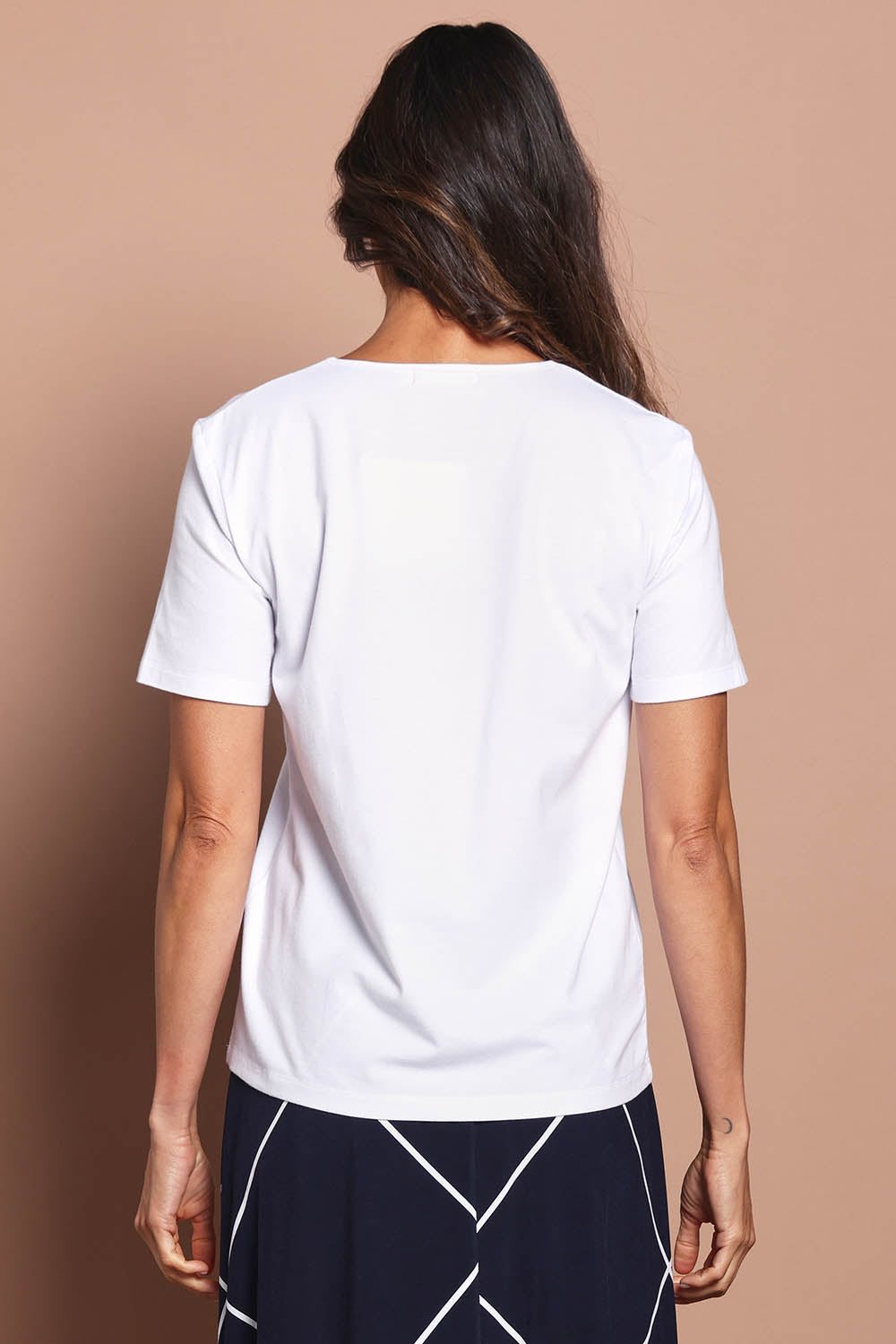 Model Amanda wearing size 10 of The Luxe Pima Cotton Tee in colour White (White), from the back