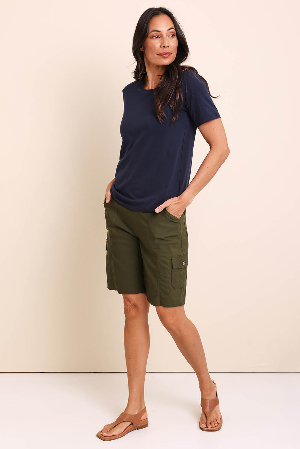 Model Amandam wearing size 10 of the The Utility Shorts  - Olive in colour Olive, from the front