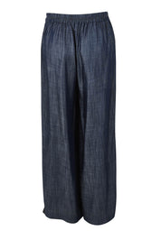 Product shot of The Luxe Chambray Pull On Pant in colour Darkdenim (Blue), from the back