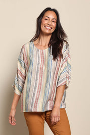 Model Amandam wearing size 10 of the The Woven Easy Wear Tee – Multistrip in colour Multistrip, in a cropped view