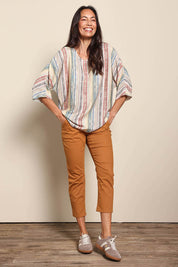 Model Amandam wearing size 10 of the The Woven Easy Wear Tee – Multistrip in colour Multistrip, from the front