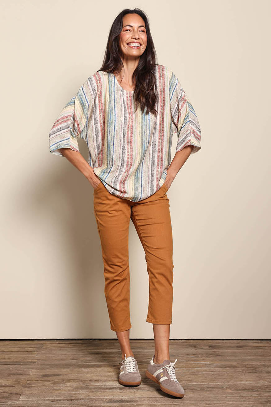 Model Amandam wearing size 10 of the The Woven Easy Wear Tee – Multistrip in colour Multistrip, from the front