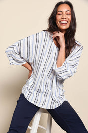 Model Amandam wearing size 10 of the The Woven Easy Wear Tee – Bluewhite in colour Bluewhite, from an angle