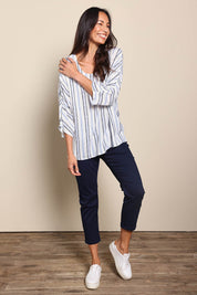 Model Amandam wearing size 10 of the The Woven Easy Wear Tee – Bluewhite in colour Bluewhite, from the front