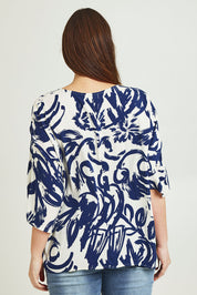 Model Jane wearing size 14 of The Woven Easywear Tee in colour Frenchblue (Blue), from the back