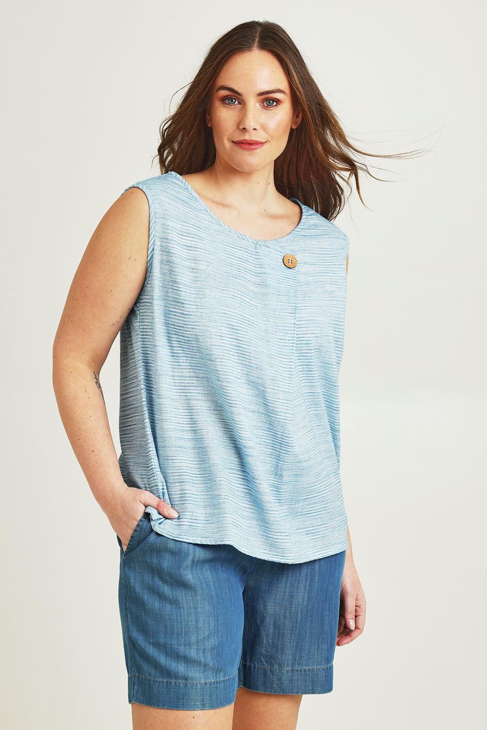 Model Jane wearing size 14 of The Shirred Waist Pull On Shorts in colour Denimblue (Blue), from the front, cropped image