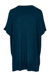 Product shot of The All Season V Neck High Low Tee in colour Blueocean (Blue), from the back