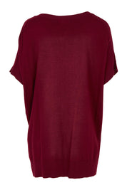 Product shot of The All Season V Neck High Low Tee in colour Sangria (Red), from the back