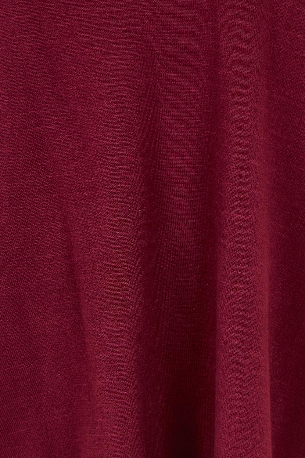 Product shot of The All Season V Neck High Low Tee in colour Sangria (Red), detail