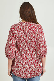 Model Jane wearing size 14 of The Relaxed Cotton Shirt in colour Raspberry (Red), from the back