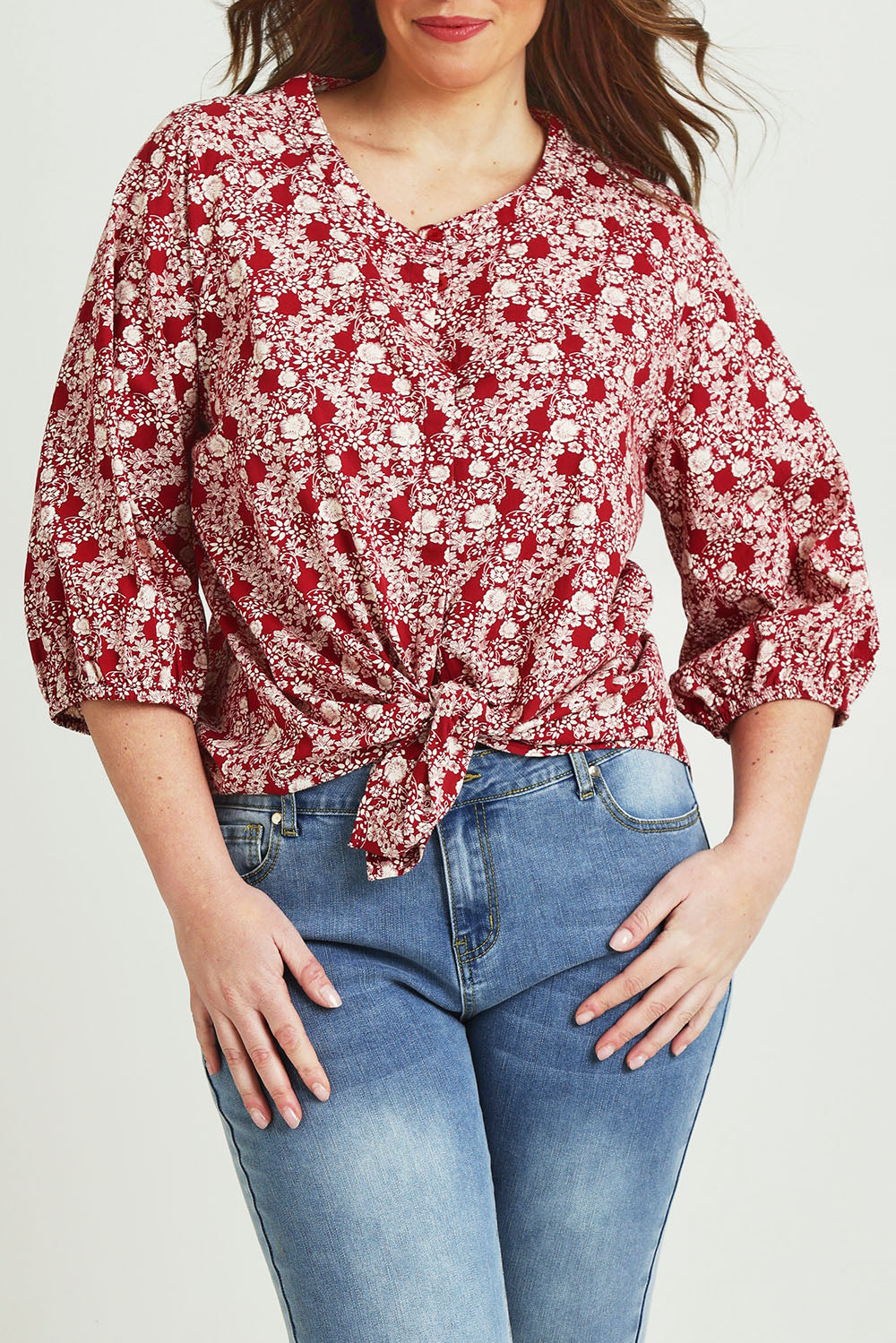 Model Jane wearing size 14 of The Relaxed Cotton Shirt in colour Raspberry (Red), from the front, cropped image
