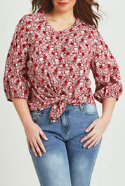 Model Jane wearing size 14 of The Relaxed Cotton Shirt in colour Raspberry (Red), from the front, cropped image