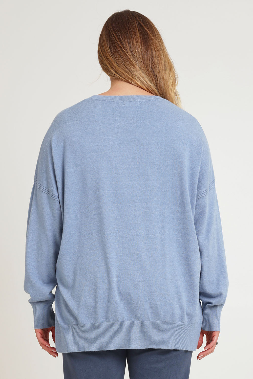 Model Chanel wearing size XL of The Modal Blend Crew Neck Jumper in colour Denim (Blue), from the back