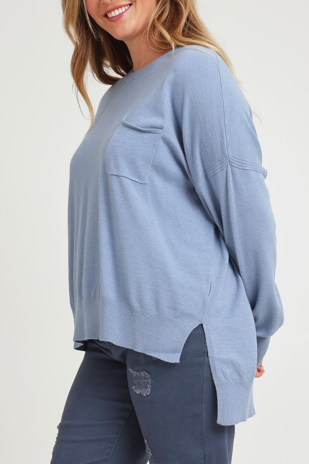 Model Chanel wearing size XL of The Modal Blend Crew Neck Jumper in colour Denim (Blue), from the front, cropped image