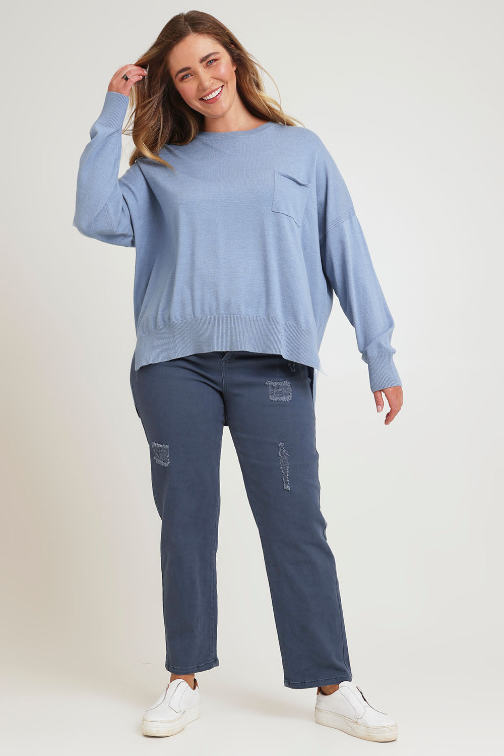 Model Chanel wearing size XL of The Modal Blend Crew Neck Jumper in colour Denim (Blue), from the front, showing the whole outfit