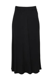 Product shot of The Pull On Bias Skirt in colour Black (Black), from the back