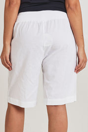 Model Terri-Leigh wearing size 14 of The Rib Waistband Short in colour White (White), from the back