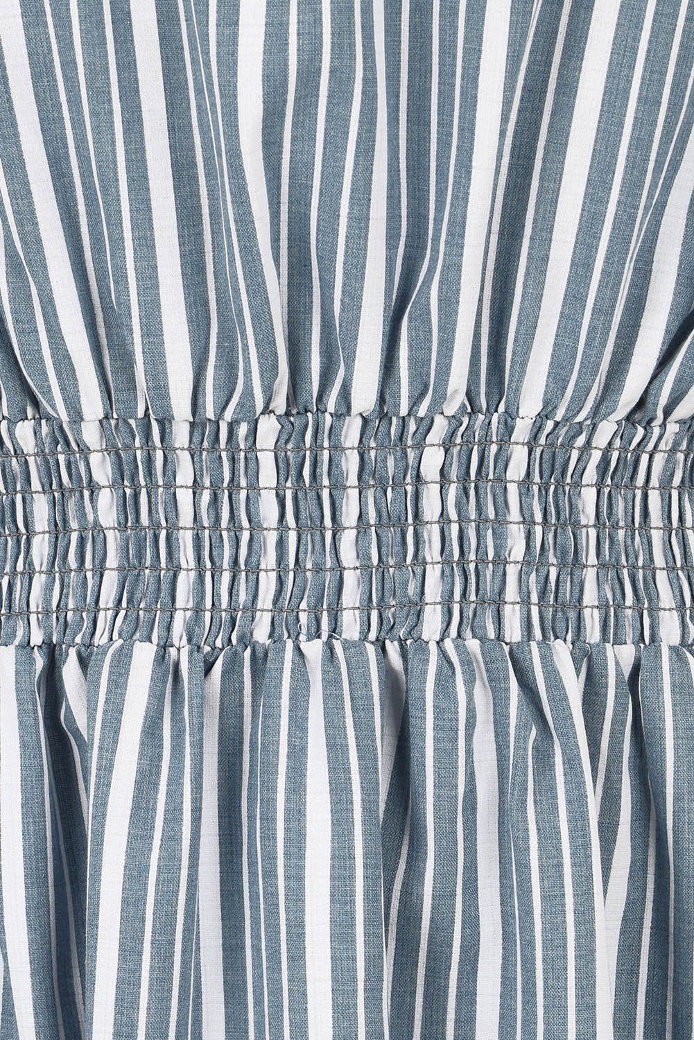 Product shot of The Cotton Shirred Waist Dress in colour Denimblue (Blue), detail