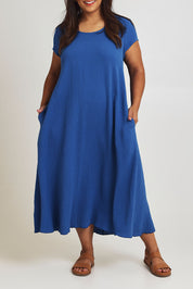 Model Ashleigh wearing size 16 of The Double Cotton Maxi Dress in colour Skyblue (Blue), from the front, cropped image