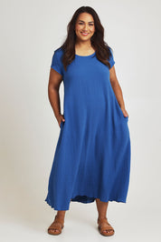 Model Ashleigh wearing size 16 of The Double Cotton Maxi Dress in colour Skyblue (Blue), from the front, showing the whole outfit
