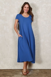 Model Madeline wearing size 10 of The Double Cotton Maxi Dress in colour Skyblue (Blue), from the front, showing the whole outfit