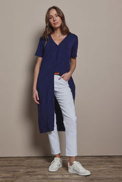 Model Madeline wearing size 10 of The Pack & Go Luxe Bamboo Button Up Dress with Pockets in colour Frenchnavy (Blue), from the front, showing the whole outfit