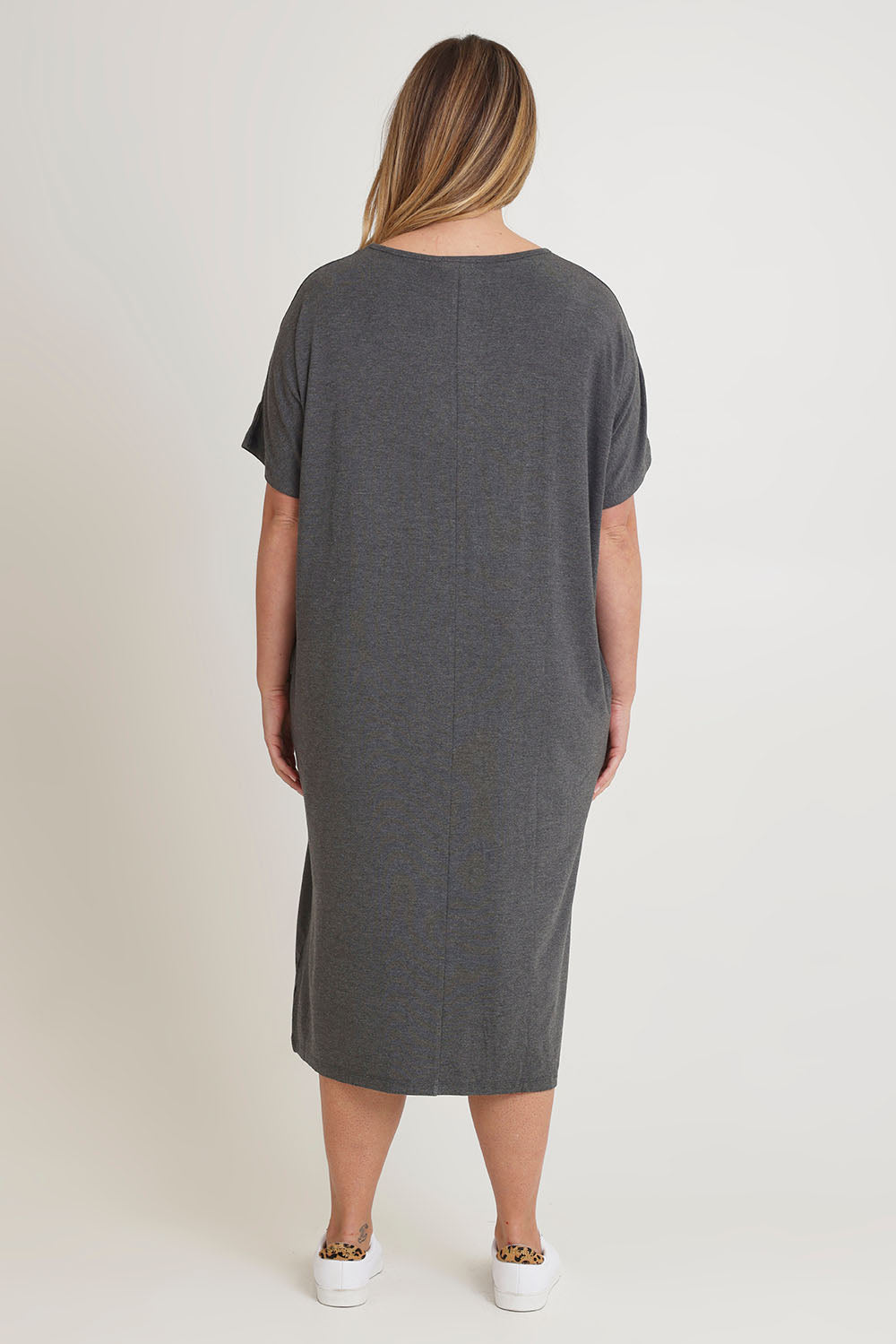 Model Chanel wearing size 16 of The Pack & Go Luxe Bamboo Pull On Dress with Pockets in colour Charcoal (Grey), from the back