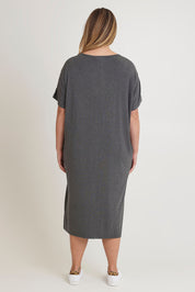 Model Chanel wearing size 16 of The Pack & Go Luxe Bamboo Pull On Dress with Pockets in colour Charcoal (Grey), from the back
