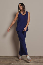 Model Amanda wearing size 10 of The Pack & Go Luxe Bamboo Wide Leg Pant in colour Frenchnavy (Blue), from the front, showing the whole outfit