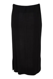Product shot of The Pack & Go Luxe Bamboo Pull On Maxi Skirt in colour Black (Black), from the back