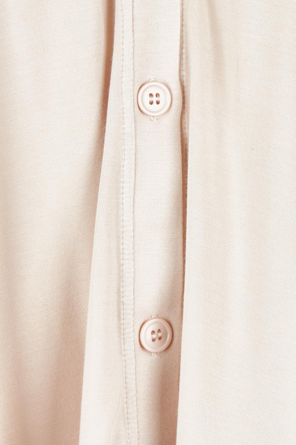 Product shot of The Pack & Go Luxe Bamboo Shrug in colour Nougat, detail