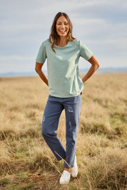 Model Amanda wearing size 10 of The Distressed Coloured Jean in colour Bluesteel (Blue), from the front, showing the whole outfit