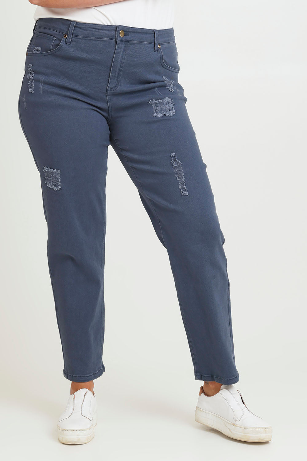 Model Chanel wearing size 16 of The Distressed Coloured Jean in colour Bluesteel (Blue), from the front, cropped image