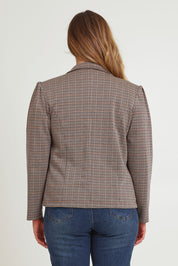 Model Chanel wearing size 16 of The Classic Houndstooth Blazer in colour Tanblack, from the back