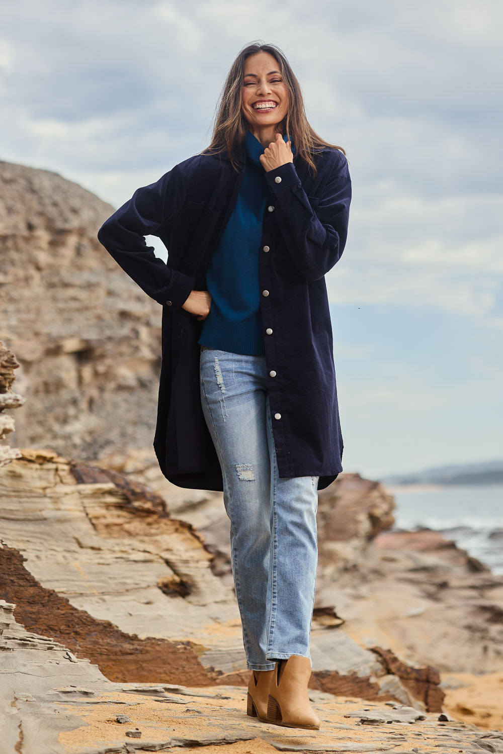 Model Amanda wearing size 10 of The Cord Shacket Dress With Pockets in colour Darknavy (Blue), from the front, showing the whole outfit