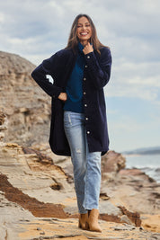 Model Amanda wearing size 10 of The Cord Shacket Dress With Pockets in colour Darknavy (Blue), from the front, showing the whole outfit