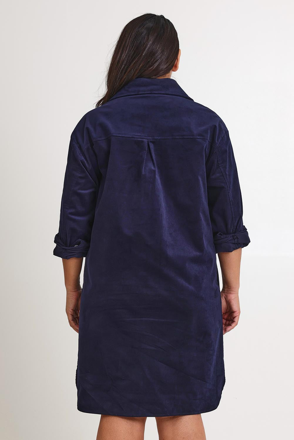 Model Ashleigh wearing size 16 of The Cord Shacket Dress With Pockets in colour Darknavy (Blue), from the back