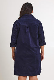 Model Ashleigh wearing size 16 of The Cord Shacket Dress With Pockets in colour Darknavy (Blue), from the back