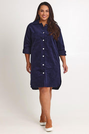Model Ashleigh wearing size 16 of The Cord Shacket Dress With Pockets in colour Darknavy (Blue), from the front, showing the whole outfit