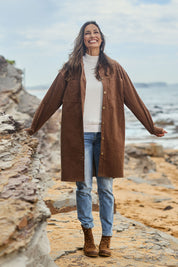 Model Amanda wearing size 10 of The Cord Shacket Dress With Pockets in colour Mushroom, from the front, showing the whole outfit