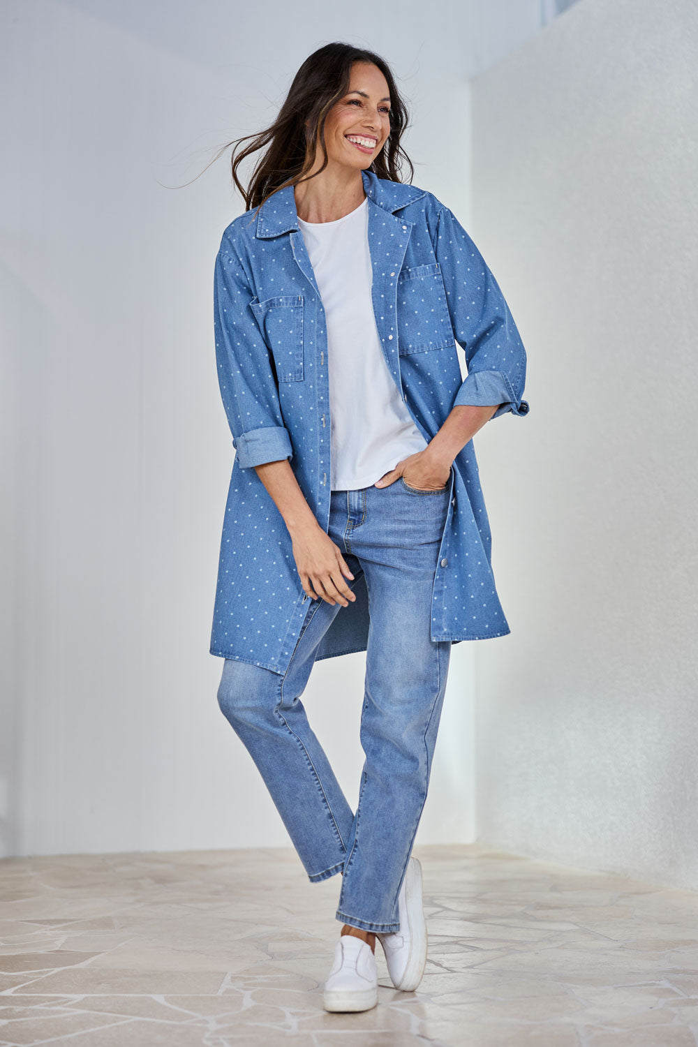 Model Amanda wearing size 10 of The Printed Denim Shacket Dress With Pockets in colour Denimspot (Blue), from the front, showing the whole outfit