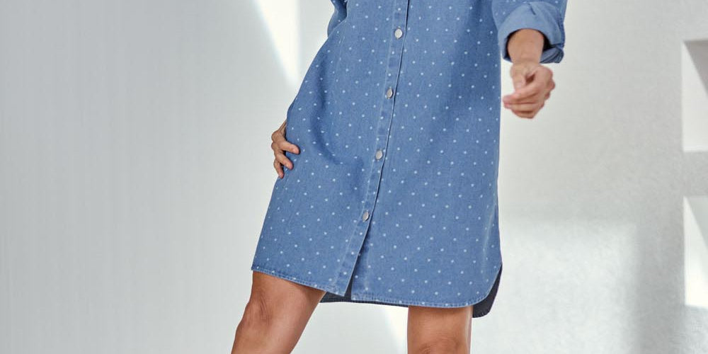 Model Amandam wearing size 10 of the The Printed Denim Shacket Dress With Pockets - Denimspot in colour Denimspot, from the front