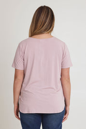 Model Chanel wearing size 16 of The Pack & Go Luxe Bamboo Tee in colour Roseblush (Pink), from the back