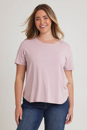 Model Chanel wearing size 16 of The Pack & Go Luxe Bamboo Tee in colour Roseblush (Pink), from the front, cropped image