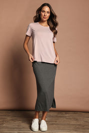 Model Madeline wearing size 10 of The Pack & Go Luxe Bamboo Tee in colour Roseblush (Pink), from the front, showing the whole outfit