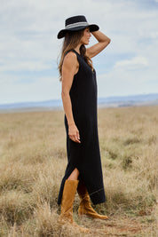 Model Amanda wearing size S of The Mock Turtle Cable Maxi Dress in colour Black (Black), from the front, showing the whole outfit