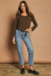 Model Madeline wearing size 10 of The Classic Long Sleeve Tee in colour Cocoa, from the front, showing the whole outfit
