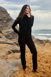 Model Amanda wearing size 10 of The Luxe Faux Suede Pull On Pant in colour Black (Black), from the front, showing the whole outfit