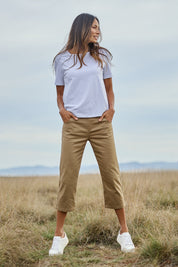 Model Amanda wearing size 10 of The Pull On Cotton Cropped Pant With Pockets in colour Fawn, from the front, showing the whole outfit